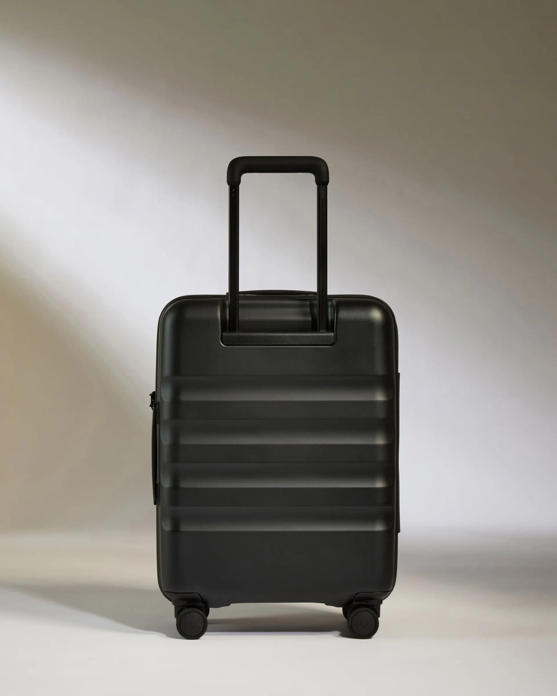 Cabin Suitcase in Black - Icon Stripe