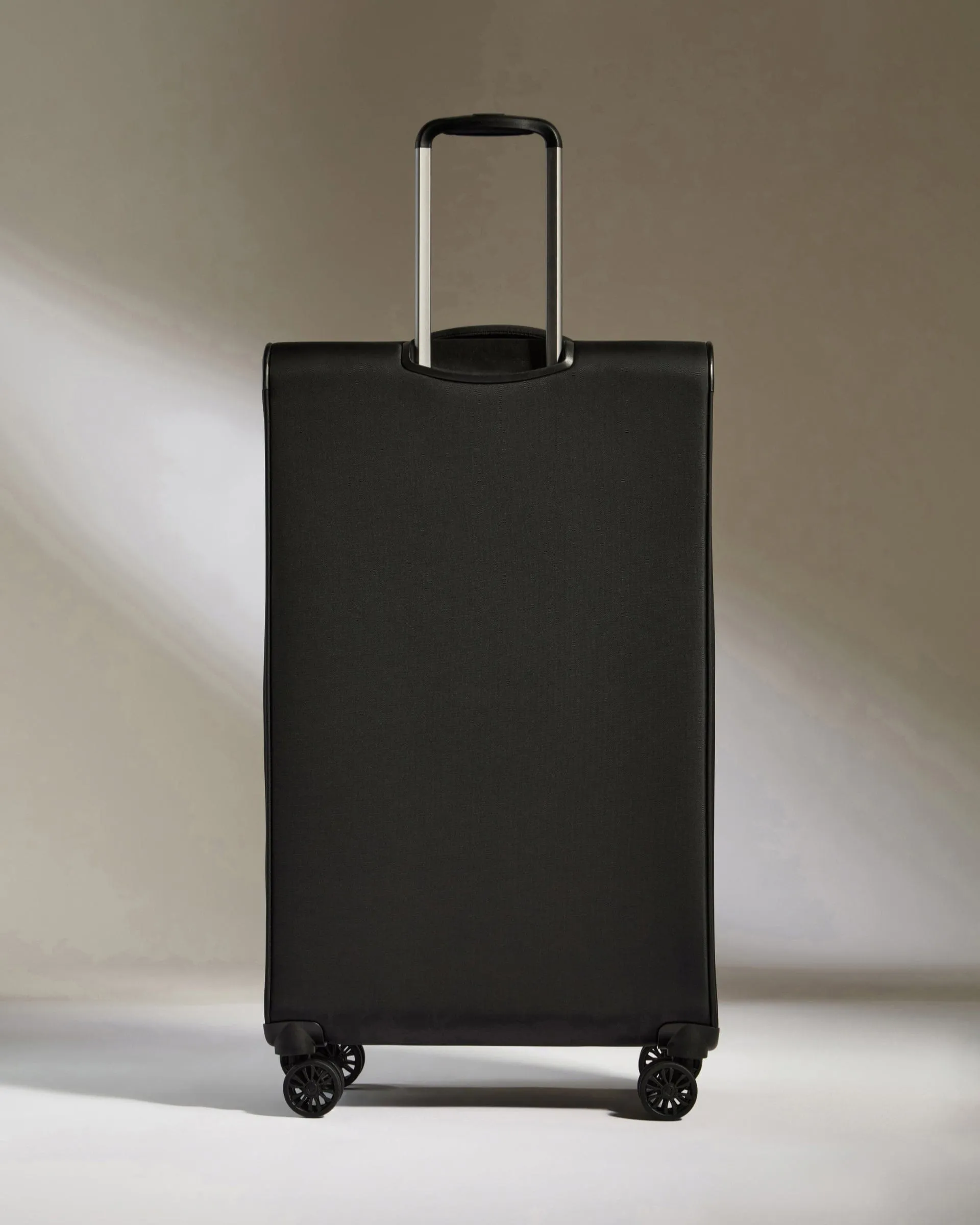 Lightest Large Suitcase in Black - Soft Stripe